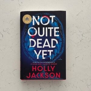 Not Quite Dead Yet by Holly Jackson - Blue & Black Hardcover